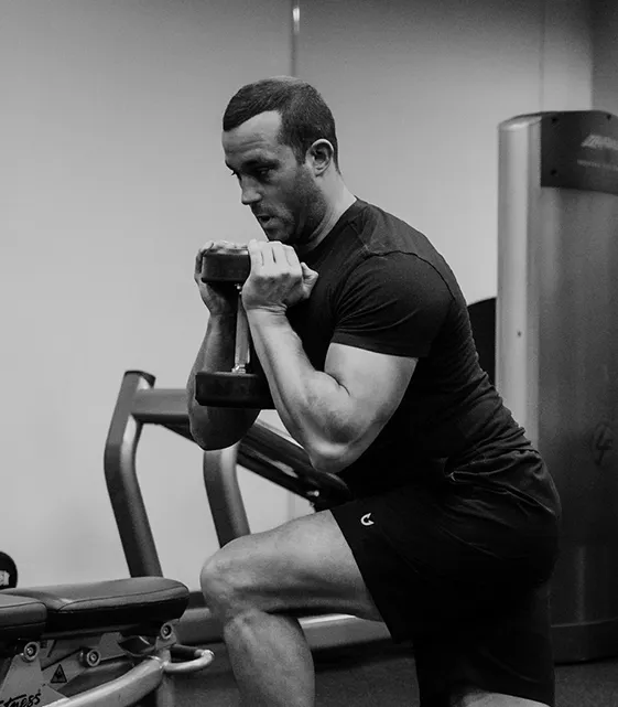 Portrait of Jason Joyce coaching in a gym